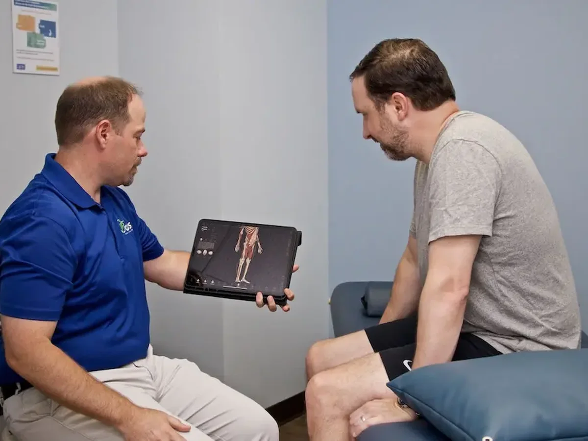 Physical therapist treating an auto accident injury patient
